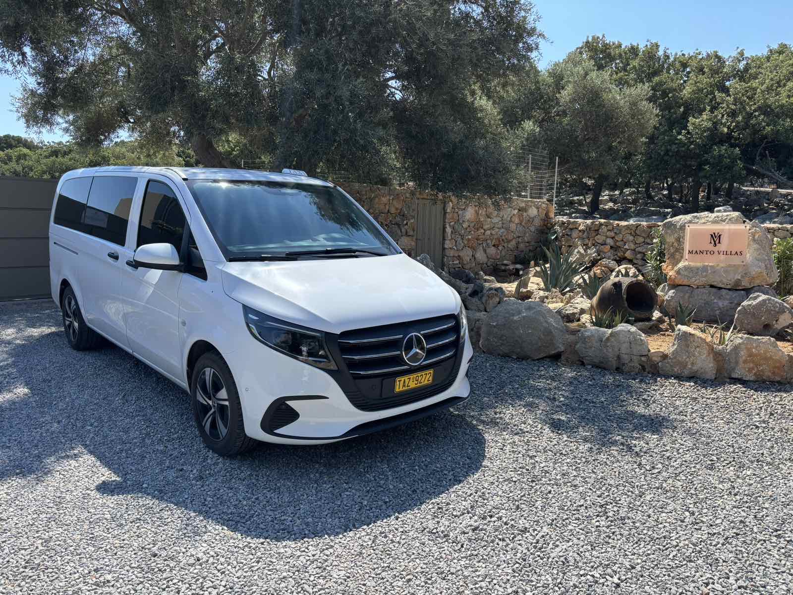 White Mercedes minivan in Crete